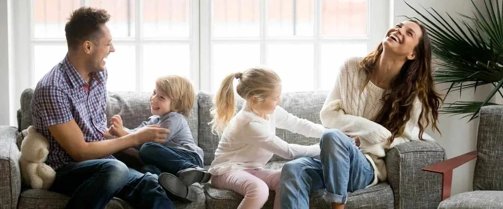 A family relaxing together in their living room